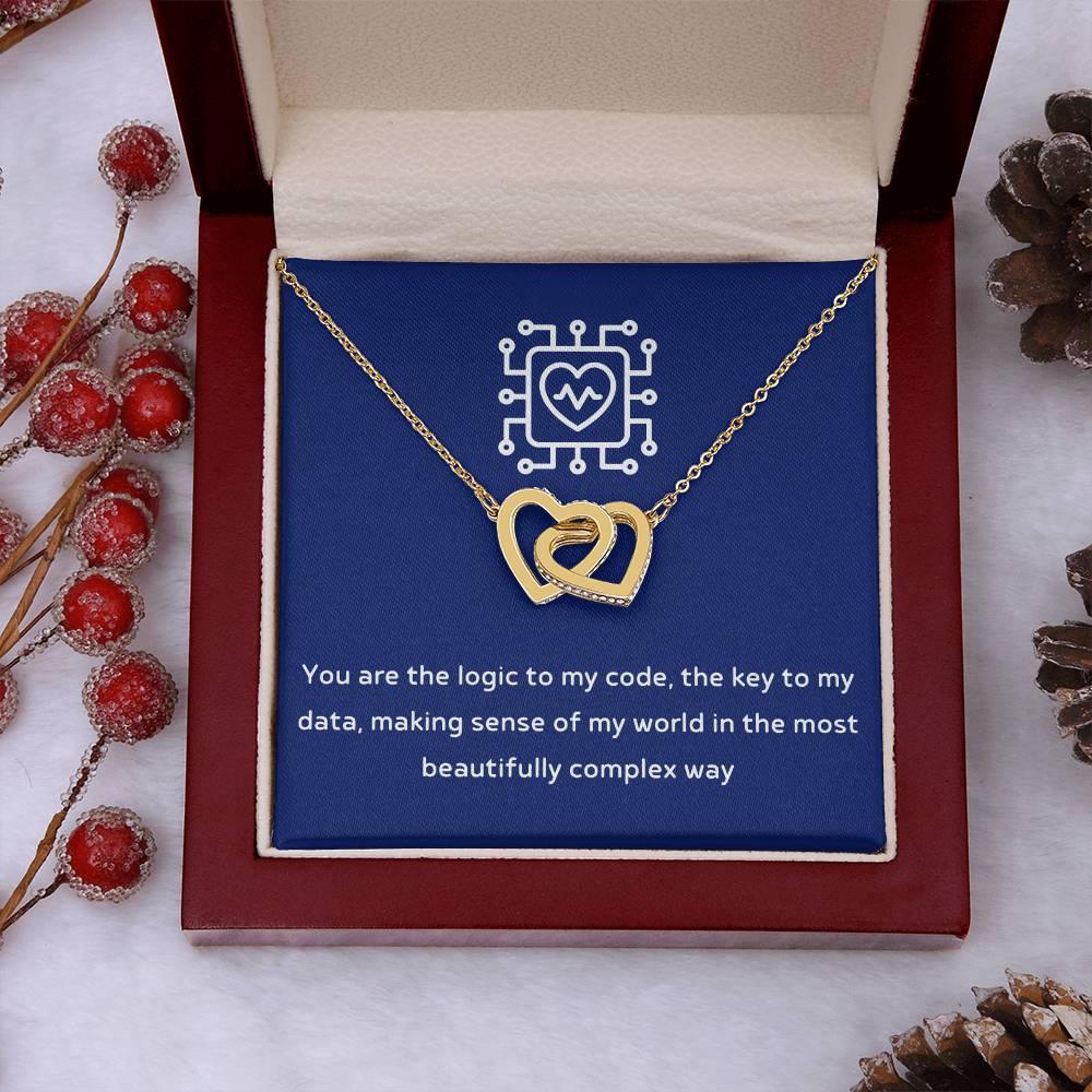 Give her the gift that symbolizes your never-ending love. Featuring two lovely hearts embellished with cubic zirconia crystals, this Interlocking Hearts necklace is the perfect accessory for everyday wear. Whether it's a memorable anniversary or a special